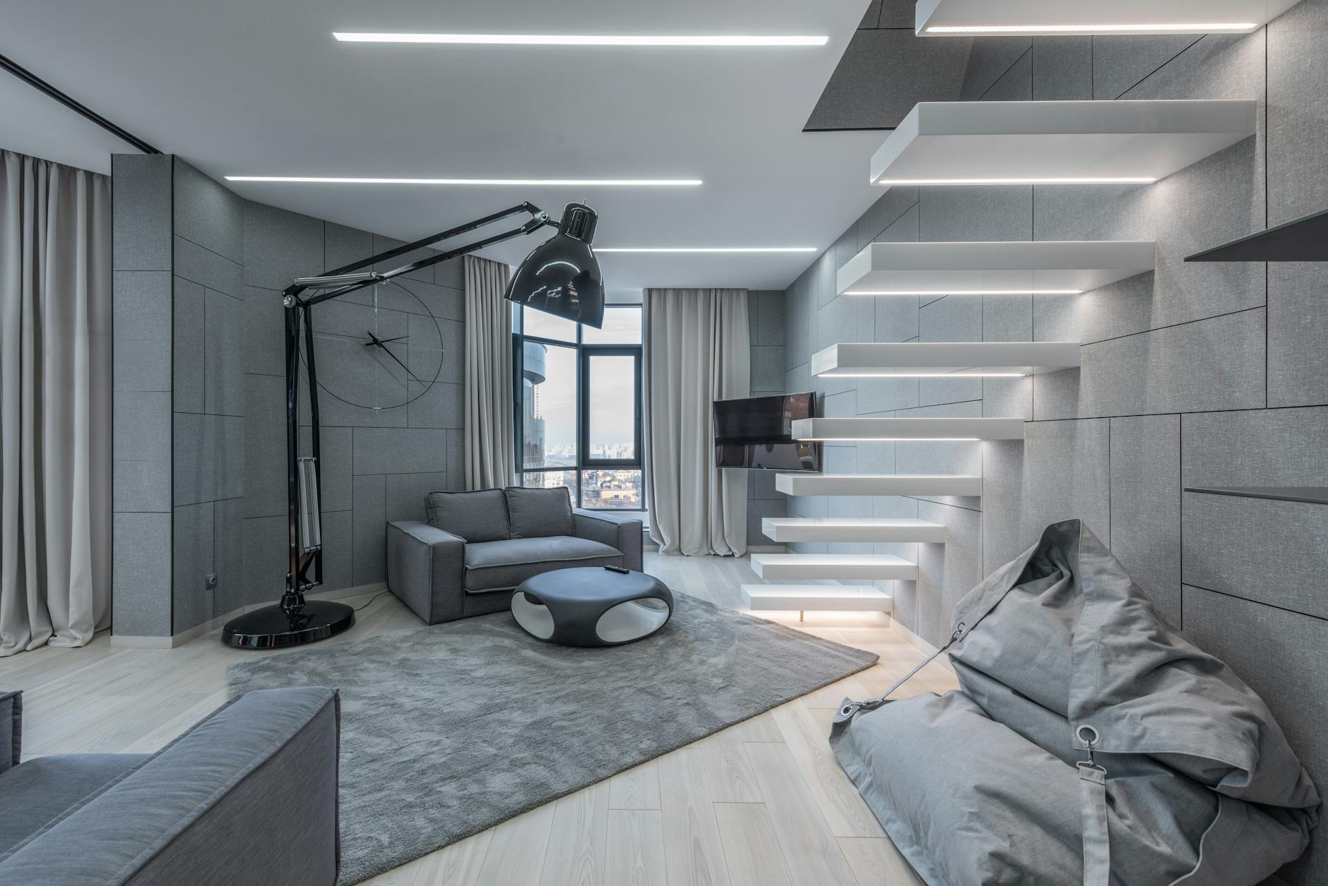 Jasny salon w nowoczesnym mieszkaniu z minimalistycznymi meblami